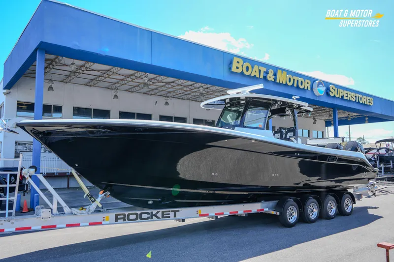 Slide: The Image of 2023 HCB 39 Speciale boat interior with storage compartments and sleek flooring design. - 81