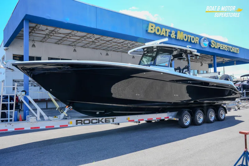 Slide: The Image of 2023 HCB 39 Speciale boat interior with sleek cabinetry and cushioned seating. - 83