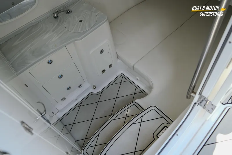 Slide: The Image of 2023 HCB 39 Speciale boat interior with cushioned seating and sleek design. - 89