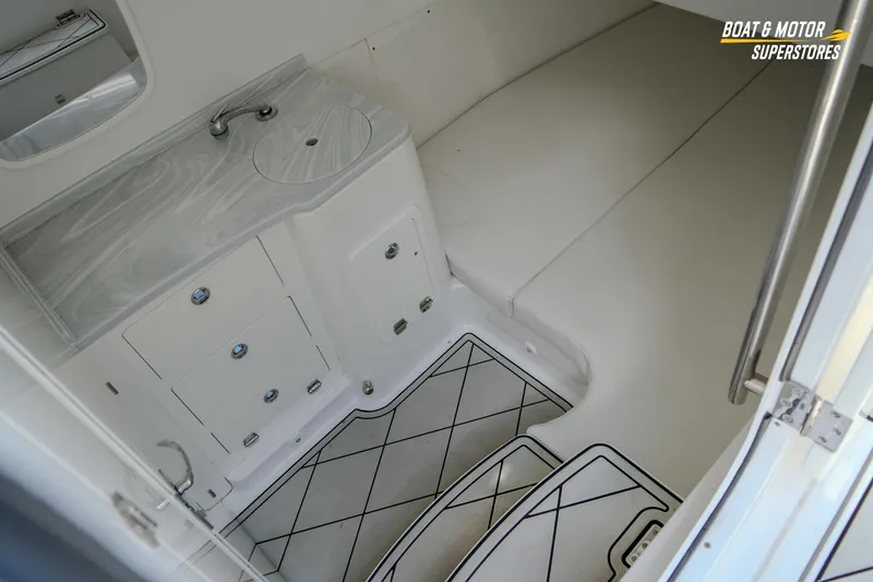 Slide: The Image of 2023 HCB 39 Speciale boat interior with luxurious seating and diamond-patterned upholstery. - 90