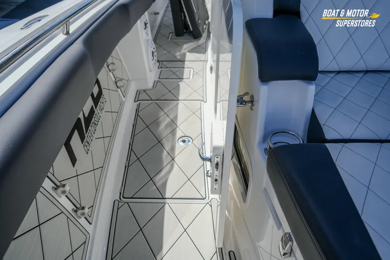 Slide: The Image of 2023 HCB 39 Speciale boat interior with diamond-stitched seating and sleek design. - 92