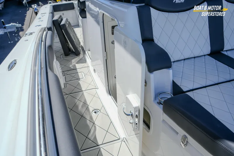 Slide: The Image of 2023 HCB 39 Speciale boat interior with luxurious seating and diamond-patterned upholstery. - 93