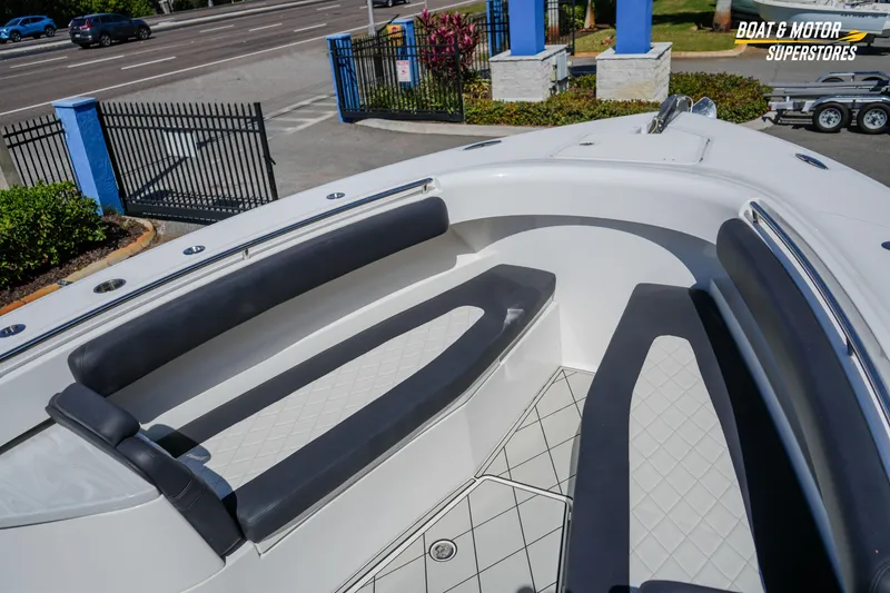 Slide: The Image of 2023 HCB 39 Speciale luxury boat interior at dealership, showcasing seating and design. - 94