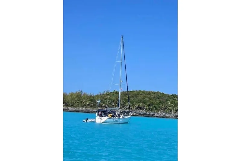 Slide: The Image of Catalina 42 sailboat deck with anchor and rigging, 1989 model. - 13