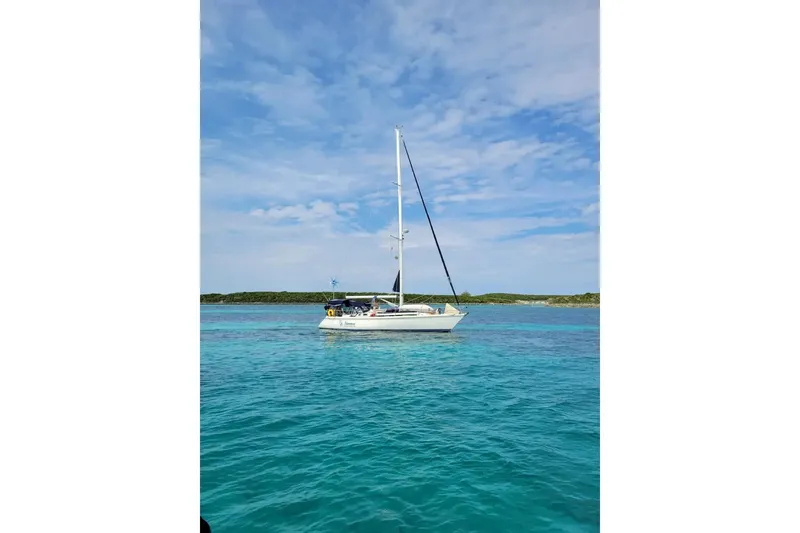 Slide: The Image of Close-up of Catalina 42 sailboat deck hardware with rope, 1989 model. - 16