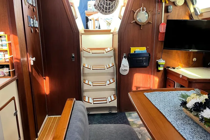 Slide: The Image of Cockpit of 1989 Catalina 42 MkII sailboat with navigation instruments and compass. - 22