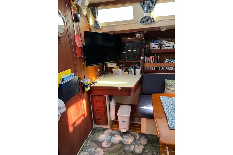 Slide: The Image of Deck of 1989 Catalina 42 sailboat with wooden hatch and metal fittings. - 25