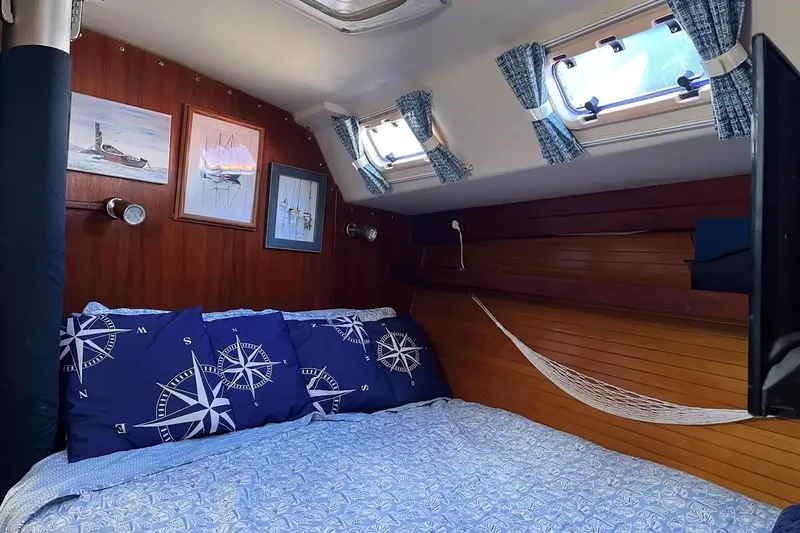 Slide: The Image of Stainless steel stove and oven in a 1989 Catalina 42 MkII yacht kitchen. - 30