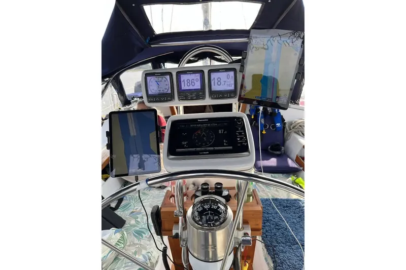 Slide: The Image of Bathroom interior of a 1989 Catalina 42 yacht with sink and washing machine. - 46