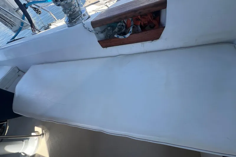 Slide: The Image of Catalina 42 sailboat deck with inflatable dinghy and gear bag, 1989 model. - 49