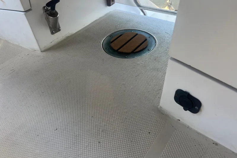 Slide: The Image of Control panel of a 1989 Catalina 42 sailboat, featuring anchor windlass switch. - 53