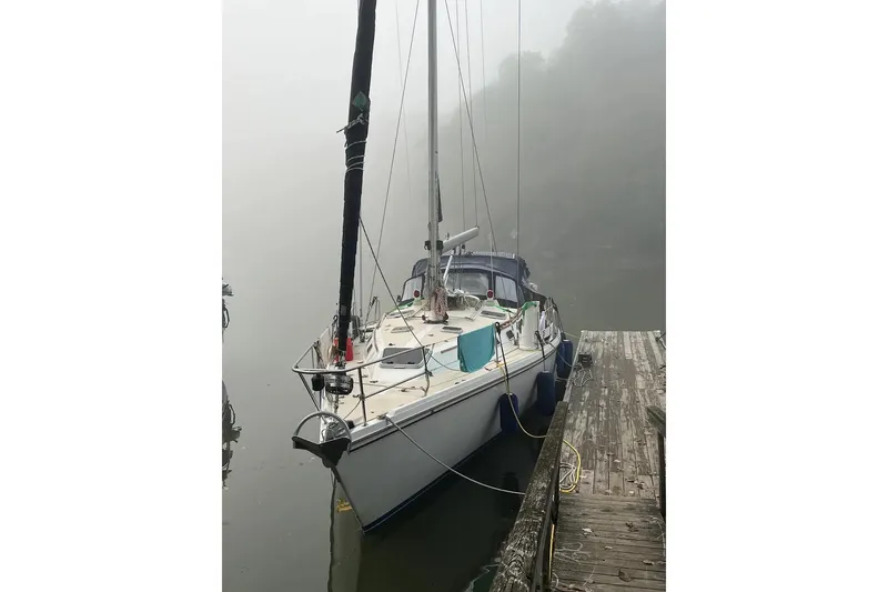 Slide: The Image of Sailboat deck with rigging and ropes, Catalina 42, 1989 model, docked in marina. - 9