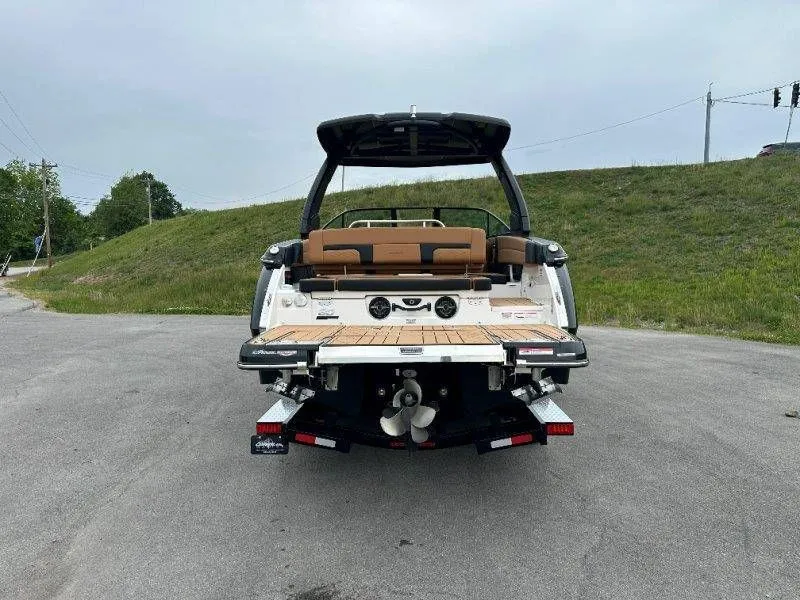 Slide: The Image of Rear view of 2026 Chaparral SSX 30 boat on asphalt. - 17
