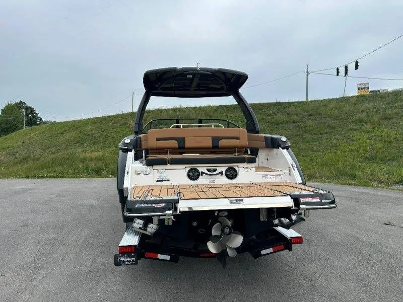 Slide: The Image of Rear view of 2026 Chaparral SSX 30 boat on asphalt. - 26