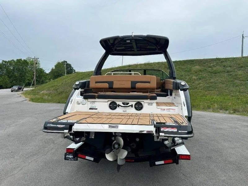 Slide: The Image of Rear view of 2026 Chaparral SSX 30 boat on a trailer. - 27
