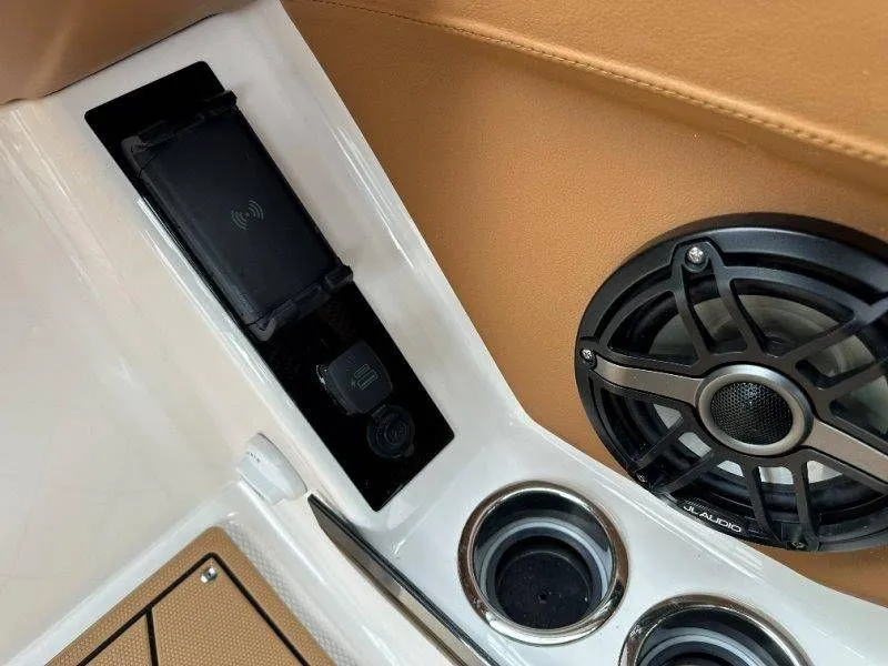 Slide: The Image of Chaparral SSX 30 2026 interior with speaker and cup holders. - 33