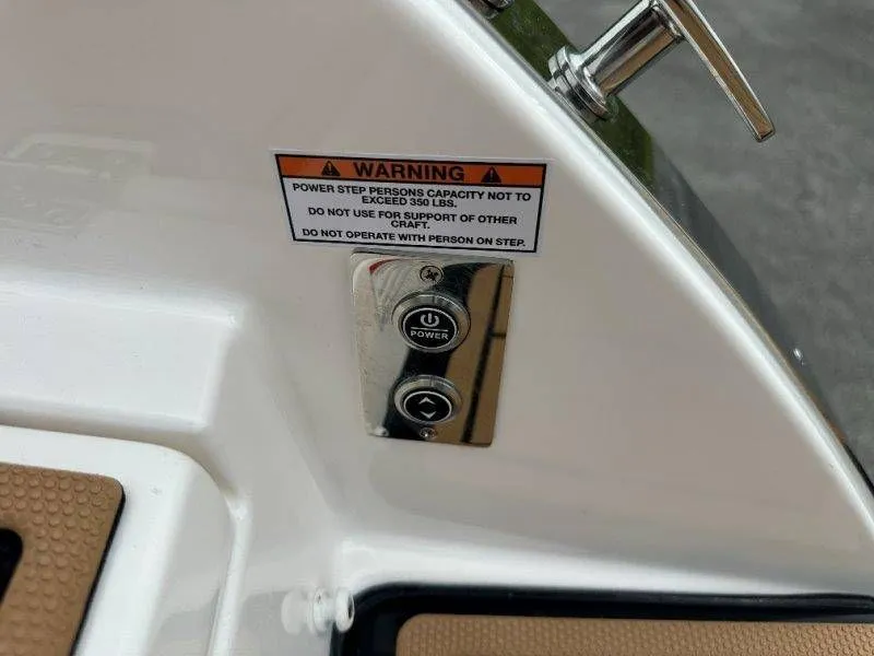 Slide: The Image of Chaparral SSX 30 boat control panel with warning label, 2026 model. - 42