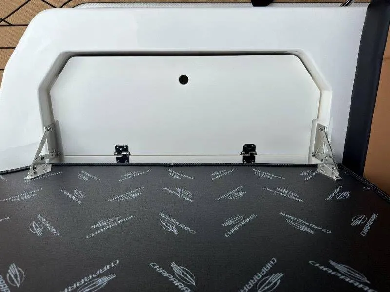 Slide: The Image of Chaparral SSX 30 2026 boat interior with storage hatch. - 47