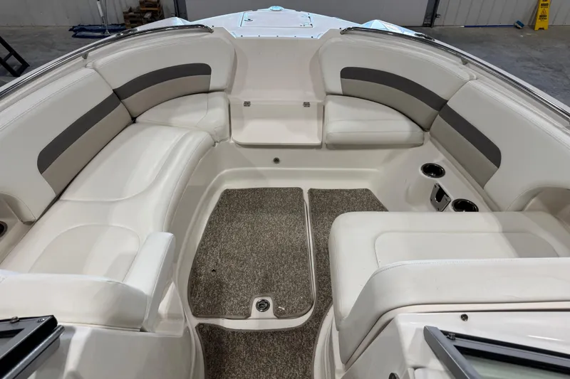 Slide: The Image of 2008 Chaparral 284 Sunesta boat interior with white seating and gray accents. - 16