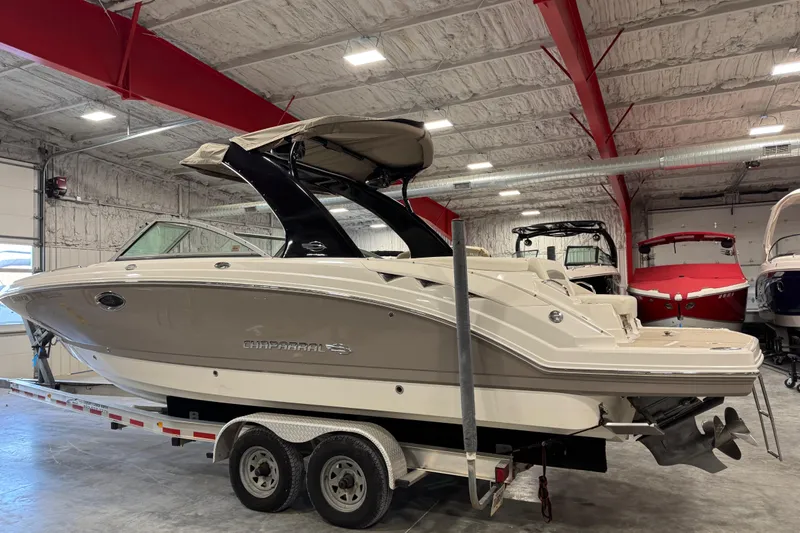 Slide: The Image of 2008 Chaparral 284 Sunesta boat on trailer in indoor storage facility. - 3