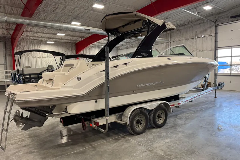 Slide: The Image of 2008 Chaparral 284 Sunesta boat on trailer in indoor storage facility. - 4