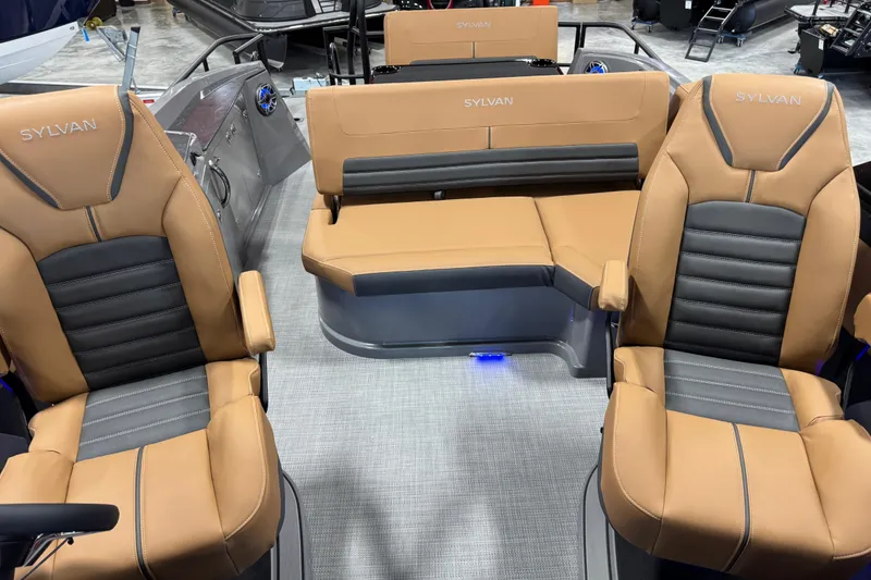 Slide: The Image of Luxurious interior of 2026 Sylvan G5 boat with tan and black seating. - 10