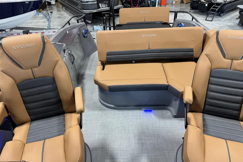Slide: The Image of 2026 Sylvan G5 boat interior with tan and black seating, showcasing modern design. - 13