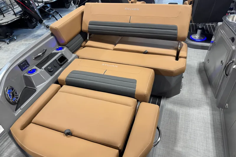 Slide: The Image of Luxurious 2026 Sylvan G5 boat interior with tan and gray seating, modern design features. - 15