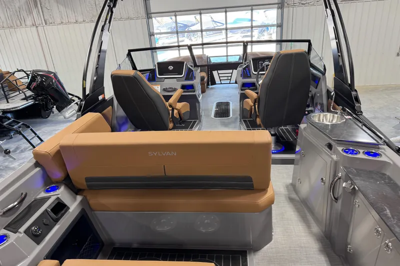 Slide: The Image of Interior of 2026 Sylvan G5 boat with modern seating and control panel. - 17
