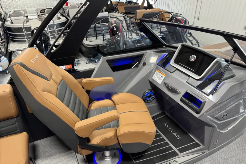Slide: The Image of Captain's seat and dashboard of 2026 Sylvan G5 boat, featuring modern design and controls. - 8