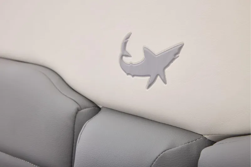 Slide: The Image of Gray shark logo on Mako 24 APEX 2026 boat seat upholstery. - 38