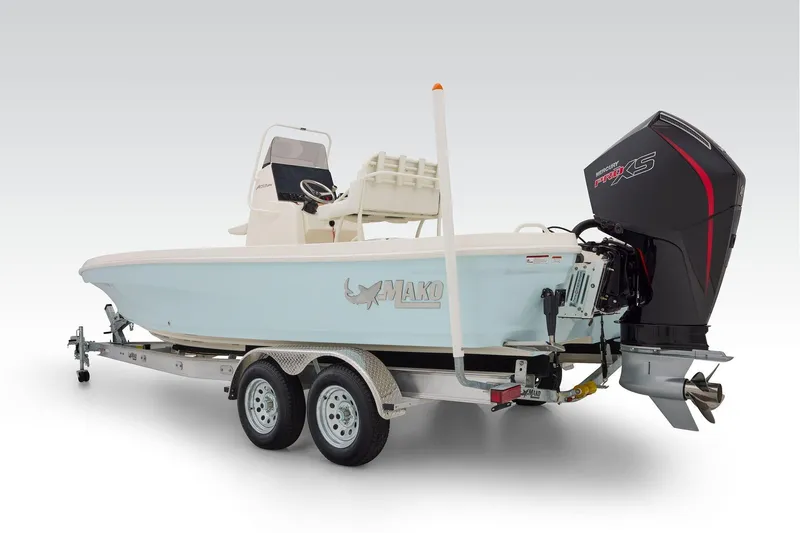 Slide: The Image of 2026 Mako 24 APEX boat on trailer with Mercury Pro XS engine. - 49