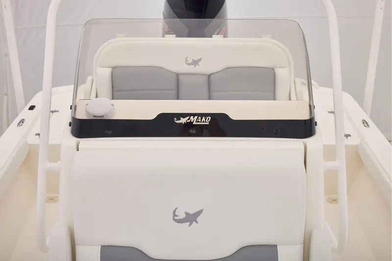 Slide: The Image of 2026 Mako 24 APEX boat interior with logo and seating details. - 21