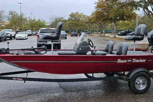 Slide: The Image of 2026 Tracker Bass Tracker Classic XL boat on trailer in parking lot. - 3