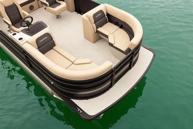 Slide: The Image of 2026 Harris Cruiser 210 SLDH boat dashboard with steering wheel and controls. - 4