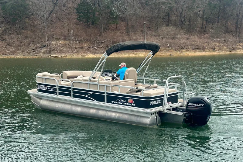 Slide: The Image of 2019 SunCatcher SF 22 XP3 pontoon boat on a lake with Mercury outboard motor. - 5