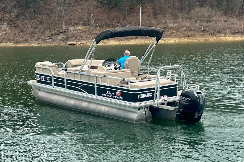 Slide: The Image of 2019 SunCatcher SF 22 XP3 pontoon boat on a lake with Mercury outboard motor. - 6