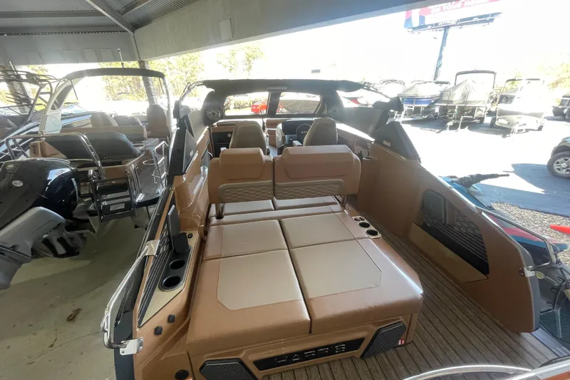 Slide: The Image of 2026 Harris Crowne SL 250 boat interior with luxurious seating and modern design. - 11