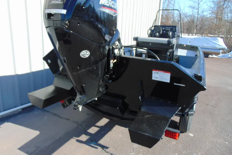 Slide: The Image of 2026 Crestliner 1760 Retriever SC boat with Mercury outboard motor, parked outdoors. - 5