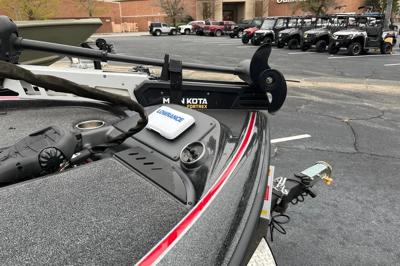 Slide: The Image of 2024 Triton 179 TrX boat with Minn Kota Fortrex trolling motor and Lowrance equipment. - 7