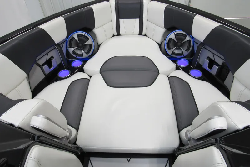 Slide: The Image of Luxurious interior of 2021 Malibu Wakesetter 23 LSV with plush seating and stylish speakers. - 11