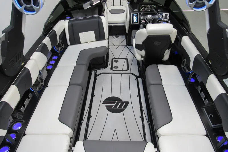 Slide: The Image of Interior of 2021 Malibu Wakesetter 23 LSV boat with luxurious seating and modern dashboard. - 4