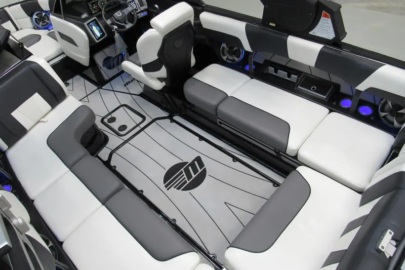 Slide: The Image of 2021 Malibu Wakesetter 23 LSV interior with sleek seating and modern dashboard design. - 6