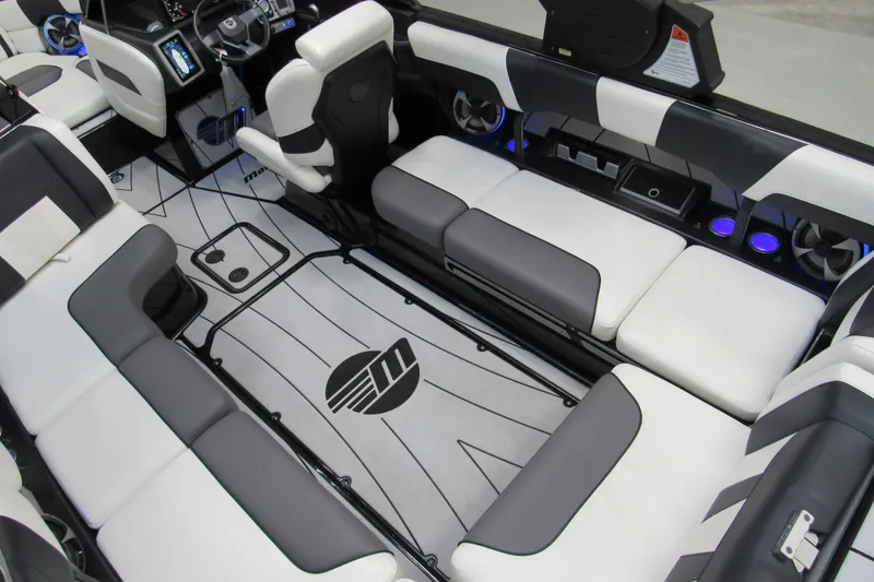 Slide: The Image of Interior of 2021 Malibu Wakesetter 23 LSV boat with modern seating and dashboard. - 8