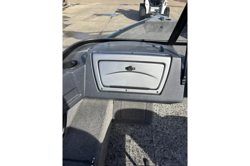 Slide: The Image of 2025 Tracker Pro Guide V-16 WT boat interior with storage compartment. - 7