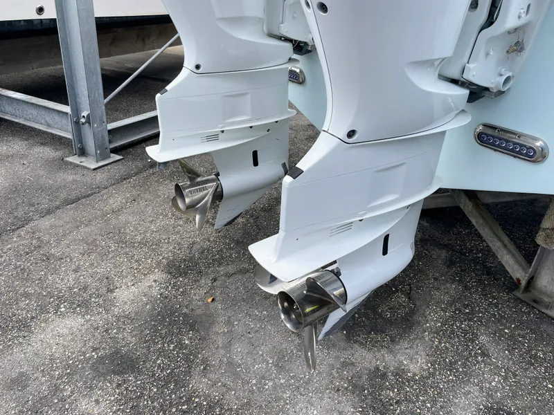Slide: The Image of Twin outboard motors of a 2019 Sea Fox 328 Commender. - 10