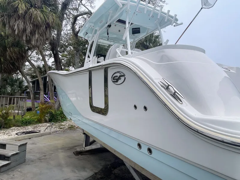 Slide: The Image of 2019 Sea Fox 328 Commander boat on a dock. - 3