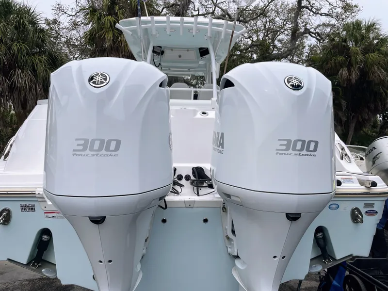 Slide: The Image of Two Yamaha 300 outboard engines on a Sea Fox 328 Commender boat. - 4