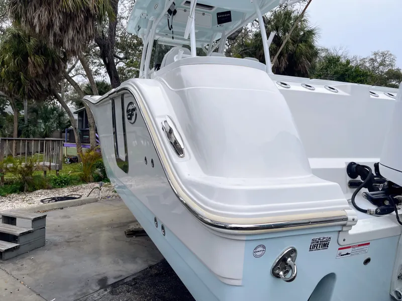 Slide: The Image of 2019 Sea Fox 328 Commender boat, side view outdoors. - 5