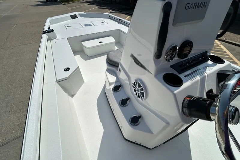 Slide: The Image of 2026 Avid 21 Recon boat interior with Garmin electronics and sleek white design. - 11
